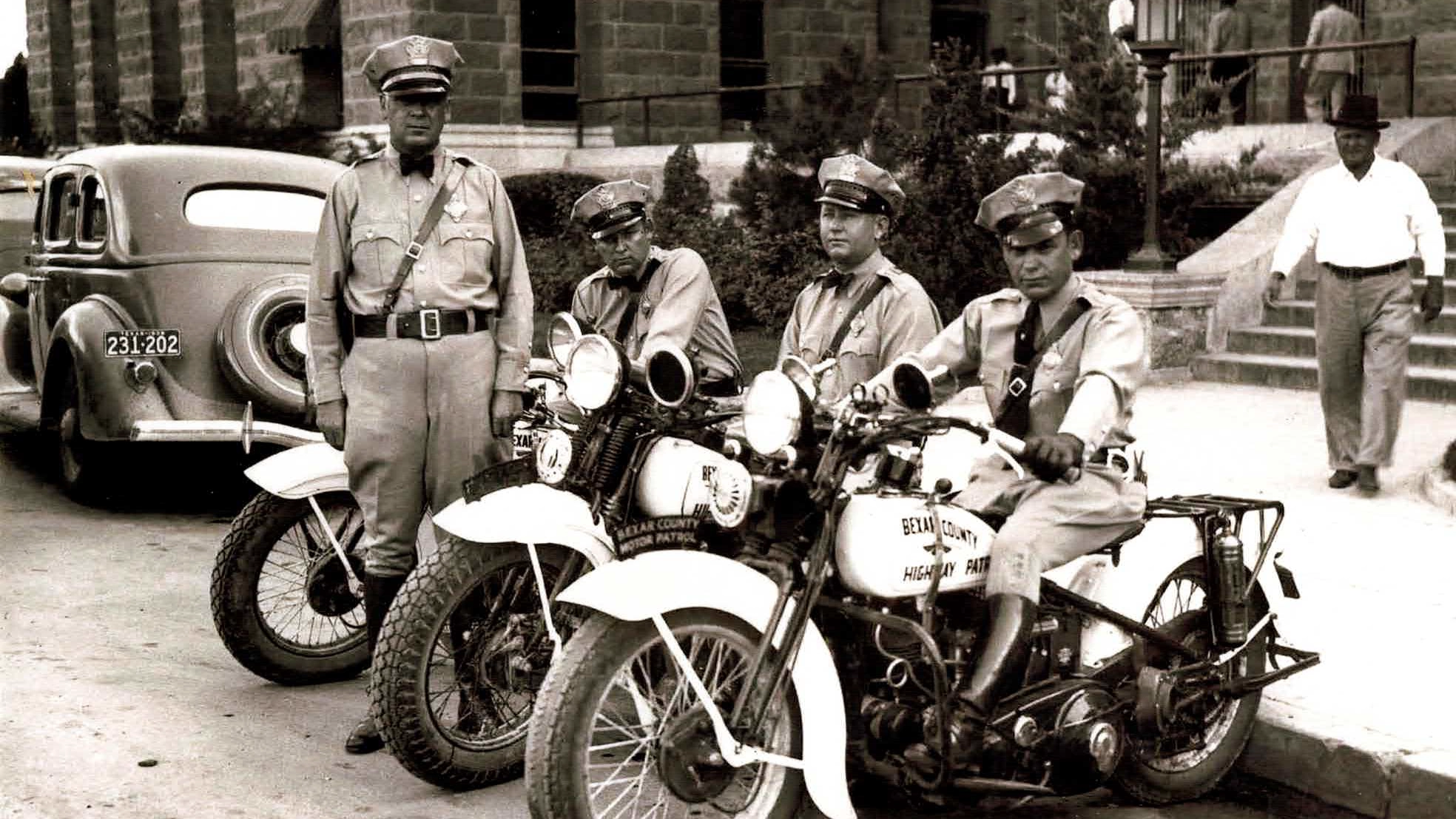 Vintage photograph of Bexar County Highway Patrol on motorcycles.